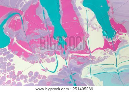 Abstraction Of The Flowing Multi-colored Acrylic Paints