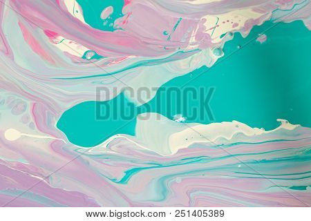 Abstraction Of The Flowing Multi-colored Acrylic Paints