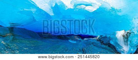 Blue Ice Cave Of Svartisen Glacier In Norway