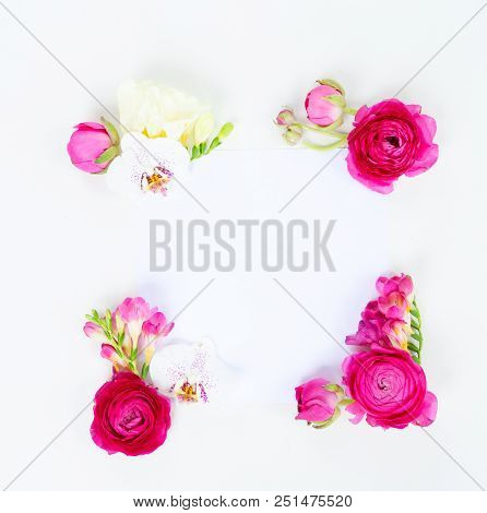 Flowers Composition. Frame Made Of Ranunculus And Orchidea Flowers On White Background. Flat Lay, To