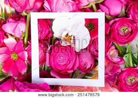 Flowers Composition. Floral Natural Background Made Of Rununculus And Orchid Flowers Flowers With Wh