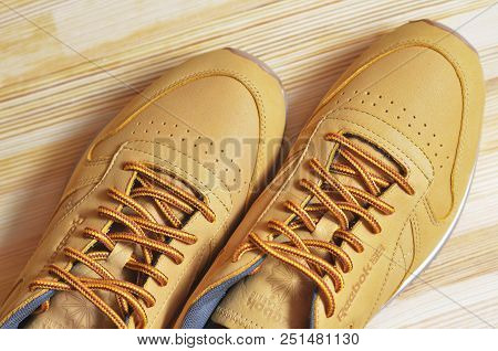 Kiev, Ukraine - May 30, 2018: Reebok Brown Sneakers With Laces On A Light Wooden Background