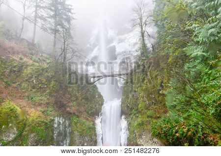 Icy Multnomah Falls Oregon In Wintertime
