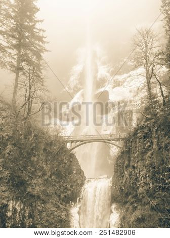 Vintage Tone Icy Multnomah Falls Oregon In Wintertime