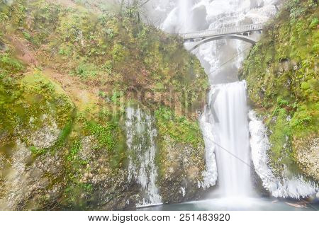 Icy Lower Tier Multnomah Falls Oregon In Wintertime