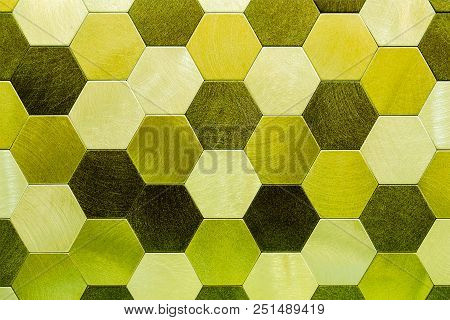 Abstract Silver With Yellow Tinge Metal Background. Geometric Hexagons. Different Color