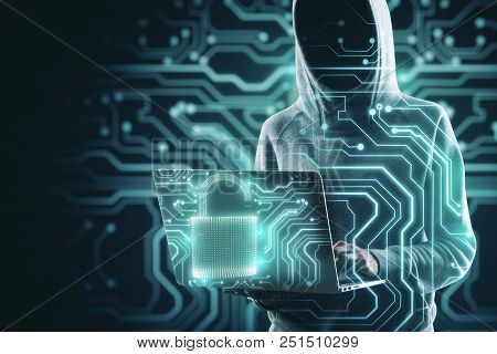 Hacker With Laptop And Digital Padlock On Abstract Glowing Circuit Background. Malware And Technolog