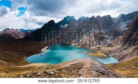 The Breathtaking View Of Krishansar Lake In Dry Season Under A Cloudy Weather From Gadsar Pass (4,08