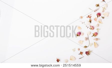 Flowers Composition. Frame Made Of Dried Rose Flowers On White Background. Flat Lay, Top View, Copy 