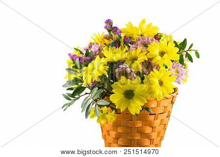 Beautiful Bouquet Of Yellow Chrysanthemums Flowers In Wicker Basket.