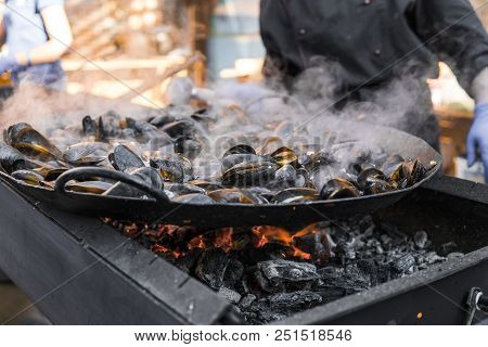 Fresh Mussels At Grill Pan. Seafood Barbecue Outdoors. Picnic Healthy Food, Mussels In Shells. Plent