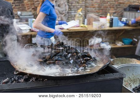 Fresh Mussels At Grill Pan. Seafood Barbecue Outdoors. Picnic Healthy Food, Mussels In Shells. Plent