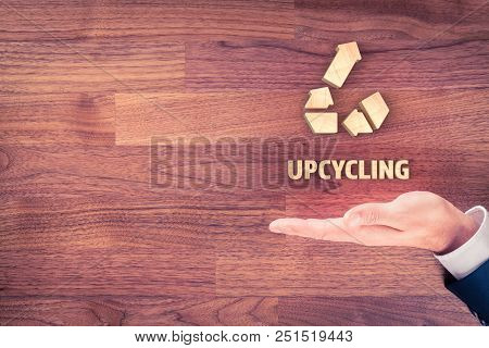 Businessman With Hand, Symbol Of Upcycling And Text Upcycling.