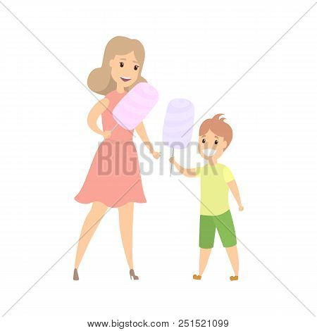 Happy Mother And Smiling Child With Cotton Candy. Family Enjoying In The Amusement Park. Isolated Fl