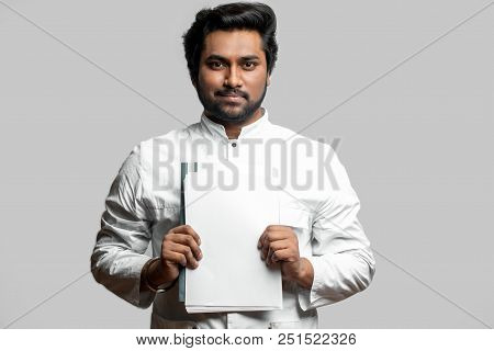 Close Up Portrait Of Doctor With Prescription In Hands. Man Holding Sick-leaver