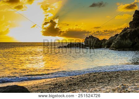 Travel Photo In St. Barths, Caribbean. Amazing View Of Sunset On Shell Beach In Gustavia, Caribbean.