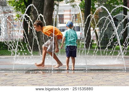 Gomel, Belarus Children Bathing In The Fountain. Square Named After Gromyko