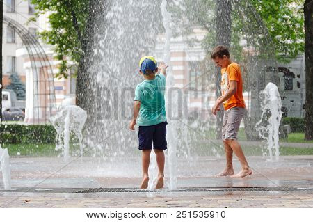 Gomel, Belarus Children Bathing In The Fountain. Square Named After Gromyko