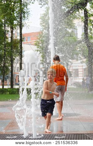 Gomel, Belarus Children Bathing In The Fountain. Square Named After Gromyko