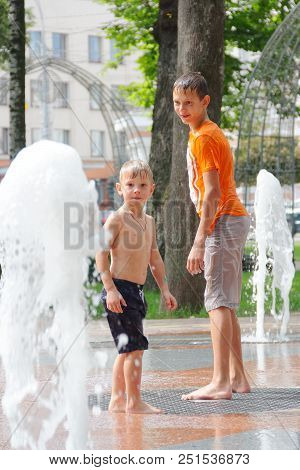 Gomel, Belarus Children Bathing In The Fountain. Square Named After Gromyko