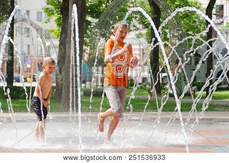 Gomel, Belarus Children Bathing In The Fountain. Square Named After Gromyko