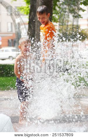 Gomel, Belarus Children Bathing In The Fountain. Square Named After Gromyko
