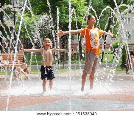 Gomel, Belarus Children Bathing In The Fountain. Square Named After Gromyko