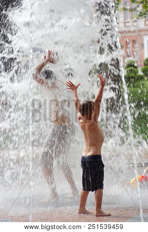 Gomel, Belarus Children Bathing In The Fountain. Square Named After Gromyko