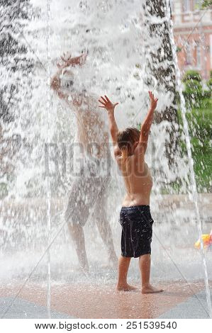 Gomel, Belarus Children Bathing In The Fountain. Square Named After Gromyko