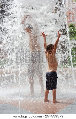 Gomel, Belarus Children Bathing In The Fountain. Square Named After Gromyko
