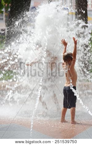 Gomel, Belarus Children Bathing In The Fountain. Square Named After Gromyko