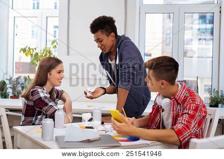 Sister And Brother. Blonde-haired Sister Coming To His Brother Studying Engineering With His Friend
