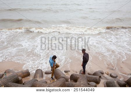 MUMBAI, INDIA - JULY 2 2018: Unidentified people visit promenade in South Mumbai. 
The promenade is an open space where people could meet friends and just spend time
