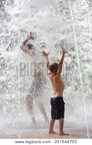 Gomel, Belarus Children Bathing In The Fountain. Square Named After Gromyko