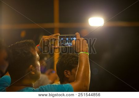 VARANASI, UTTAR PRADESH, INDIA - JULY 6, 2018: Ganga Aarti ceremony at Dasashvamedh Ghat with thousand of prayers each evenning.