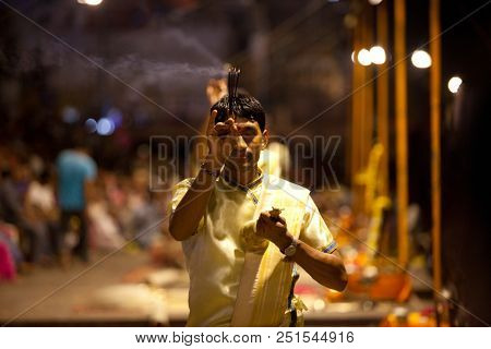 VARANASI, UTTAR PRADESH, INDIA - JULY 6, 2018: Ganga Aarti ceremony at Dasashvamedh Ghat with thousand of prayers each evenning.
