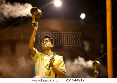 VARANASI, UTTAR PRADESH, INDIA - JULY 6, 2018: Ganga Aarti ceremony at Dasashvamedh Ghat with thousand of prayers each evenning.