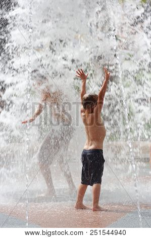 Gomel, Belarus Children Bathing In The Fountain. Square Named After Gromyko