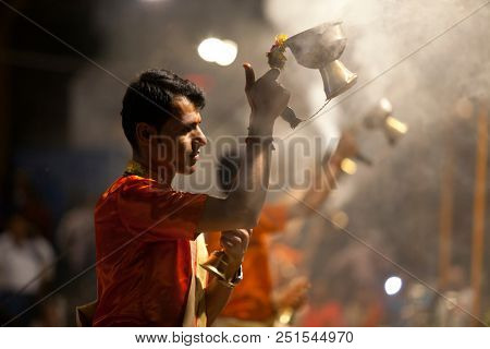 VARANASI, UTTAR PRADESH, INDIA - JULY 6, 2018: Ganga Aarti ceremony at Dasashvamedh Ghat with thousand of prayers each evenning.
