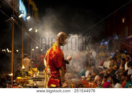 VARANASI, UTTAR PRADESH, INDIA - JULY 6, 2018: Ganga Aarti ceremony at Dasashvamedh Ghat with thousand of prayers each evenning.