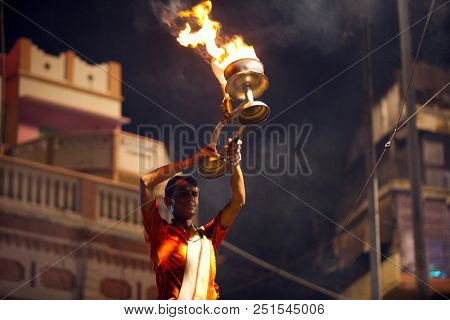VARANASI, UTTAR PRADESH, INDIA - JULY 6, 2018: Ganga Aarti ceremony at Dasashvamedh Ghat with thousand of prayers each evenning.