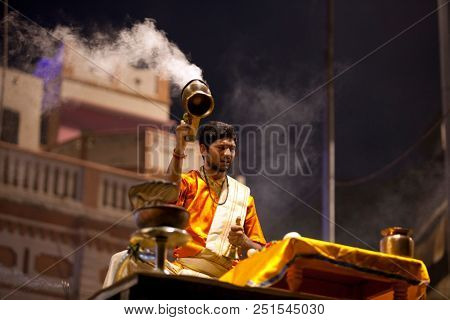 VARANASI, UTTAR PRADESH, INDIA - JULY 6, 2018: Ganga Aarti ceremony at Dasashvamedh Ghat with thousand of prayers each evenning.