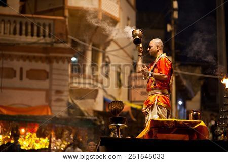 VARANASI, UTTAR PRADESH, INDIA - JULY 6, 2018: Ganga Aarti ceremony at Dasashvamedh Ghat with thousand of prayers each evenning.
