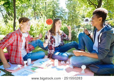 Progressive Postgraduates. Modern Progressive Postgraduates Having Brainstorming Spending Time In Na