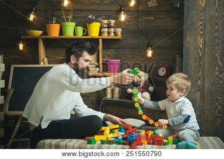 Fathers Day Concept. Father And Baby Son Play With Toys On Fathers Day. I Have Fathers Day Everyday.