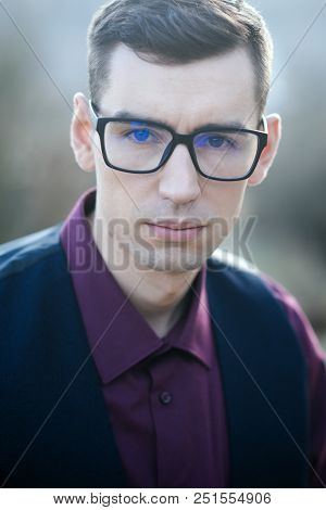 Smart Fashion. Man In Anti-reflection Glasses For Visual Improvement At Oculist. Poor Eyesight And E