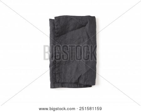 Folded Dark Black Linen Napkin Isolated On White Background. Anthracite Grey Linen Napkin. Isolated 