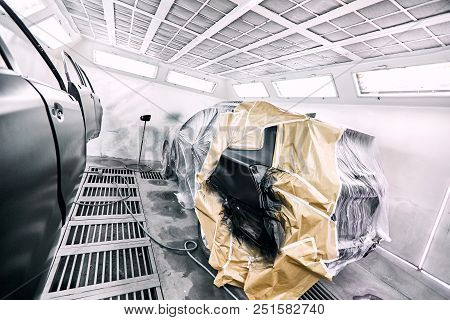 Restoration Painting Of A Black Car In The Service Center.