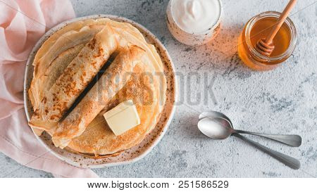 Stack Of Traditional Russian Pancakes Blini On Gray Background With Copy Space. Homemade Russian Thi