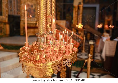 Сandle Burns, In The Christian Temple The Background Is Blurred